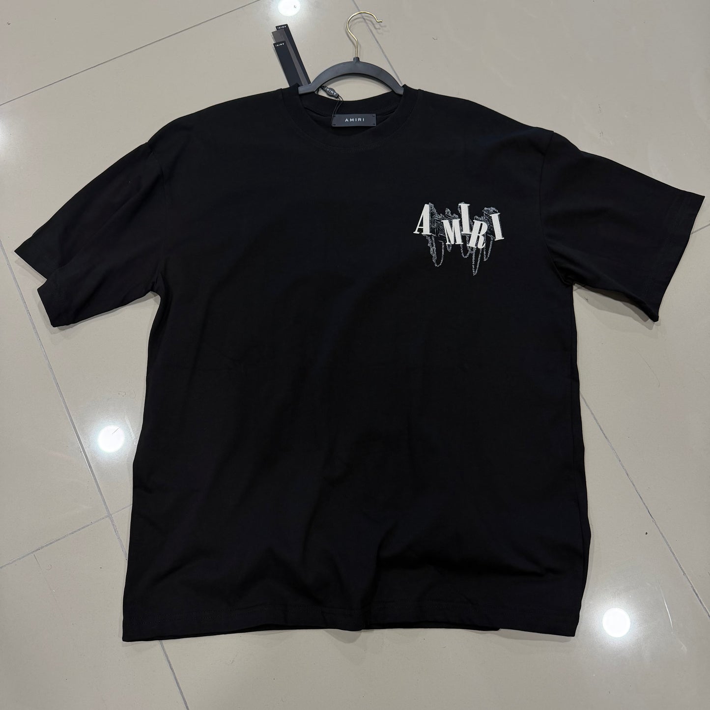 Amiri Logo Negra