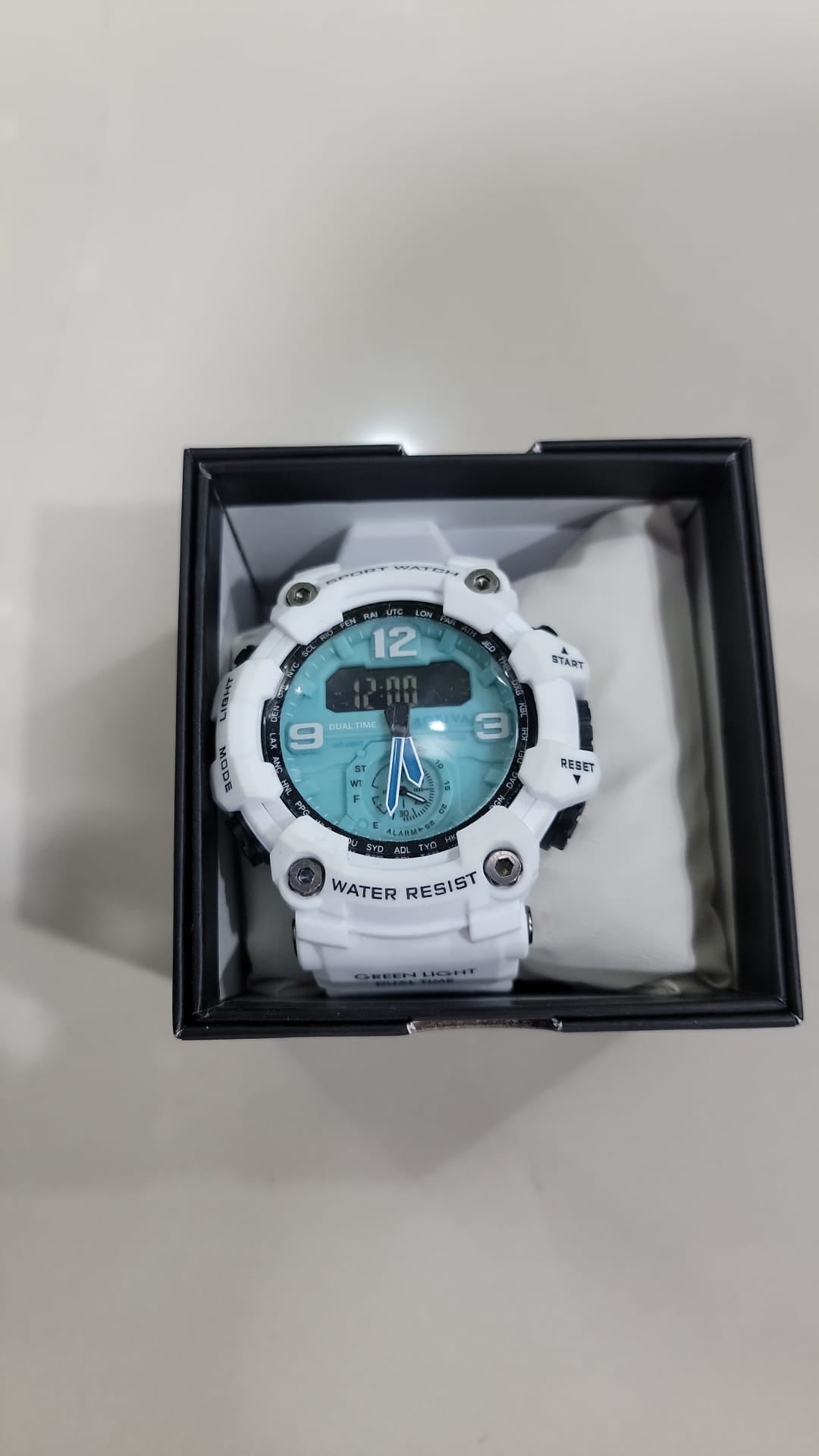 Reloj Activa Blanco y Aqua Original