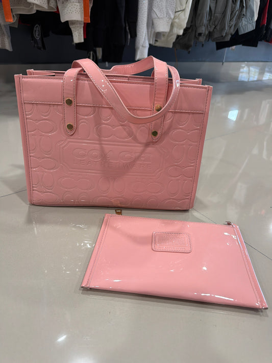 Coach rosa pastel