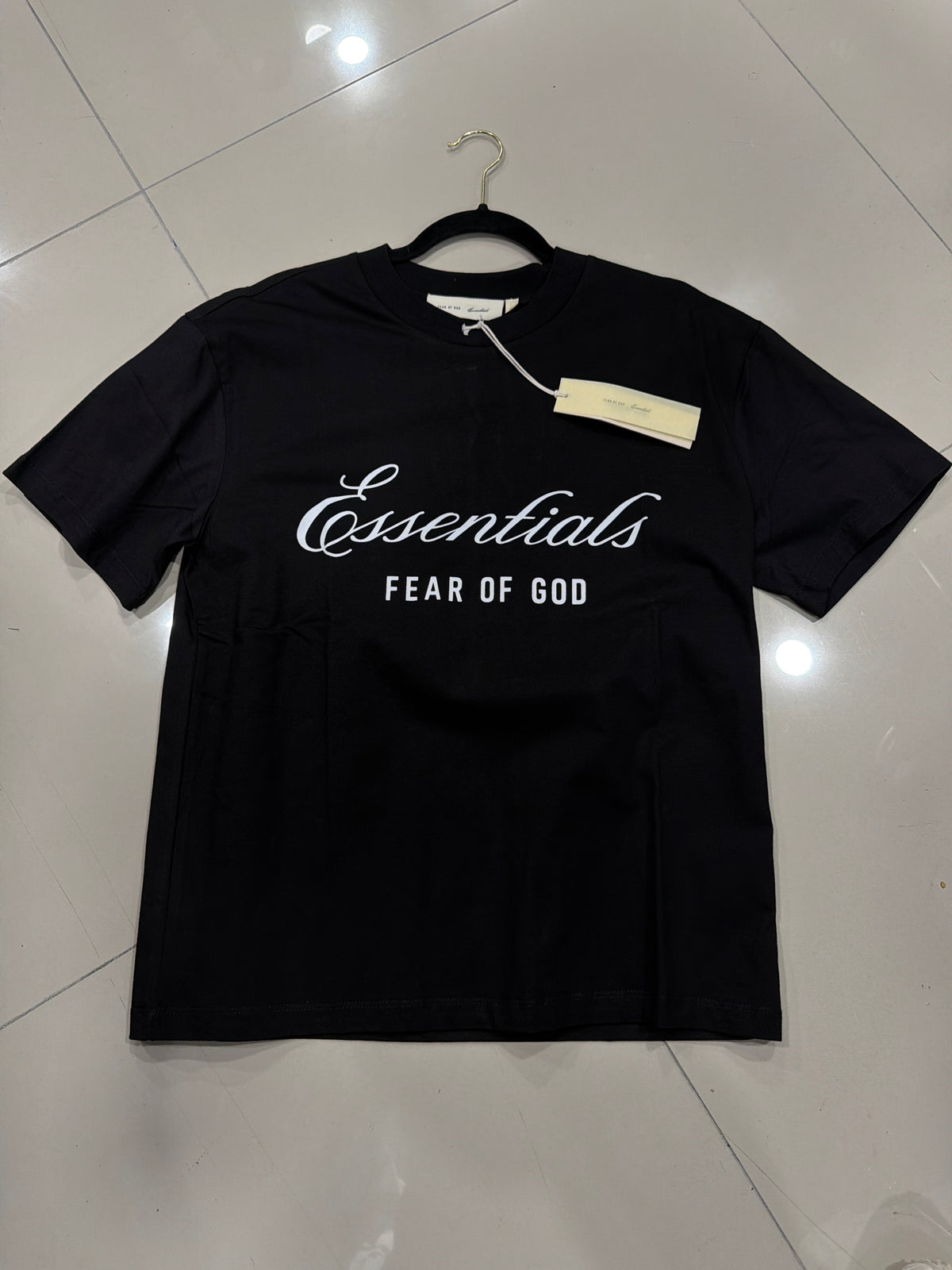 Essensials negro letras cursivo